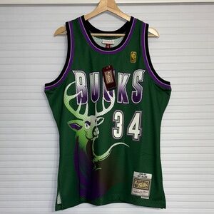 New with tags!! Vintage Mitchell & Ness Ray Allen Bucks Jersey. Size L.